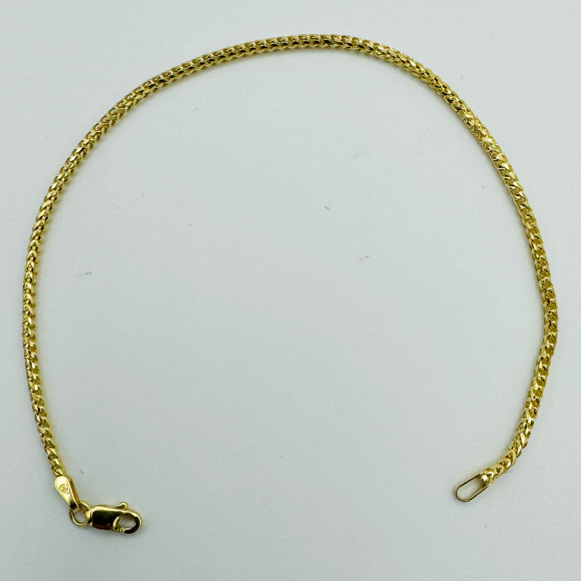 1.5MM ROUND FRANCO DIAMOND CUT SOLID BRACELET - 10K Yellow Gold