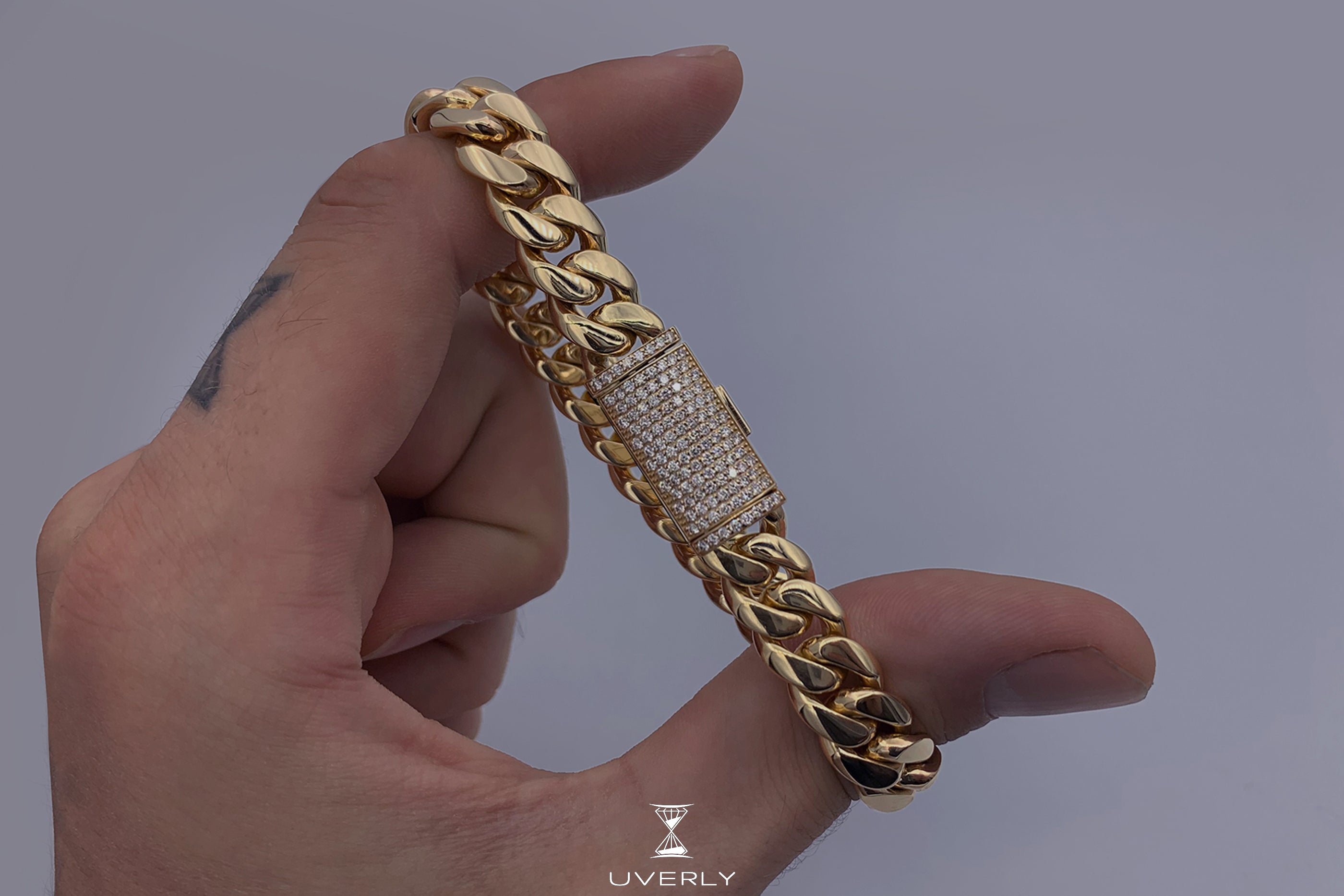 Yellow Gold Links With White Diamonds On a Cord Bracelet