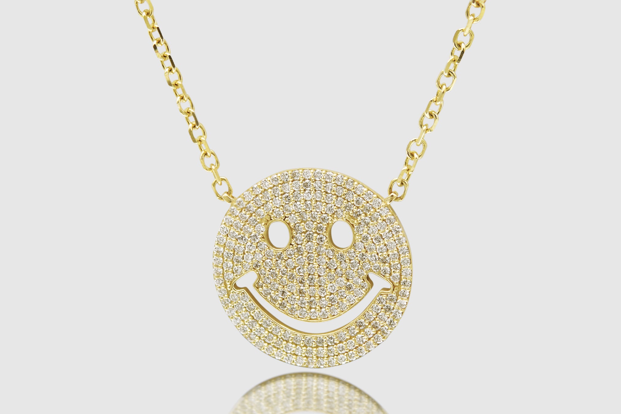Smiley face gold pendant Outlet